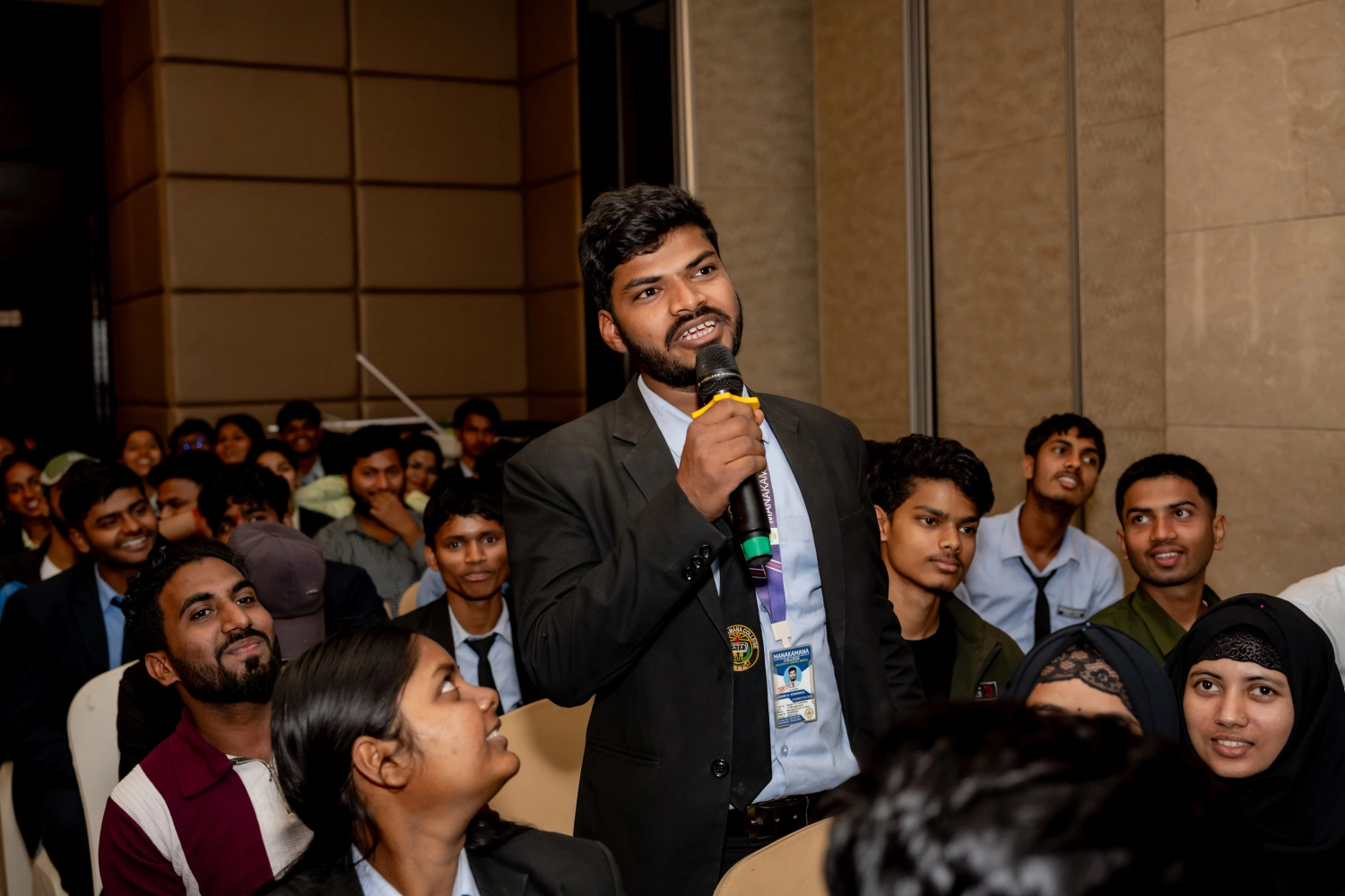 Participant speaking during Gurukul CA Mega Quiz