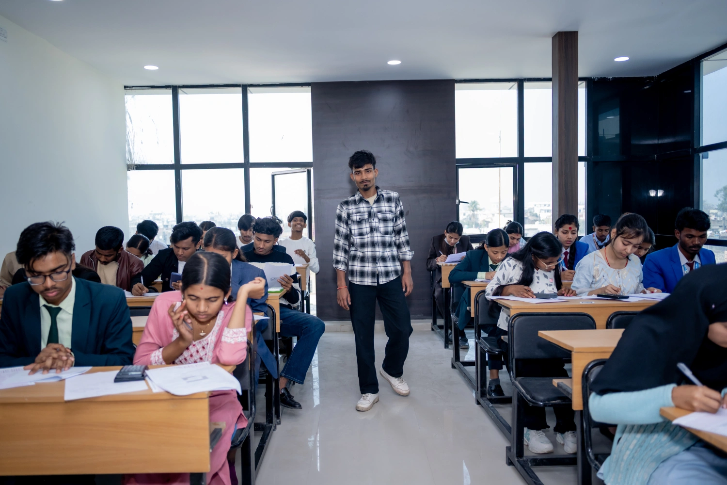 Students attending an examination with an instructor