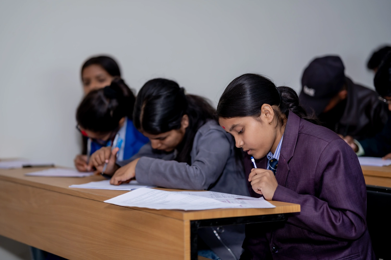 Students taking an examination in a classroom